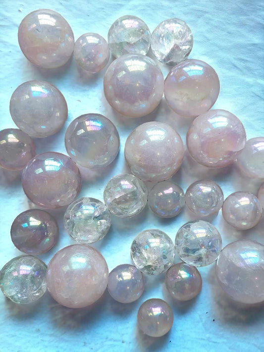 Angel aura quartz and rose quartz spheres